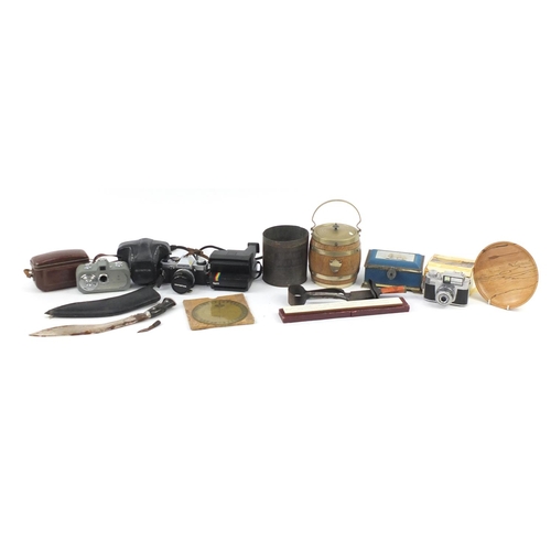 852 - Miscellaneous items including an oak biscuit barrel, Ghurkha's knife and vintage cameras