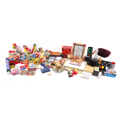 899 - Large selection of magicians items including magic tricks, top hats and playing cards