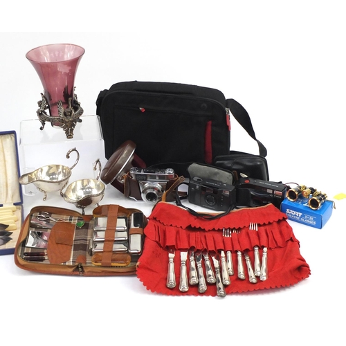 854 - Miscellaneous items including a set of cast iron scales, silver plated cutlery and vintage cameras