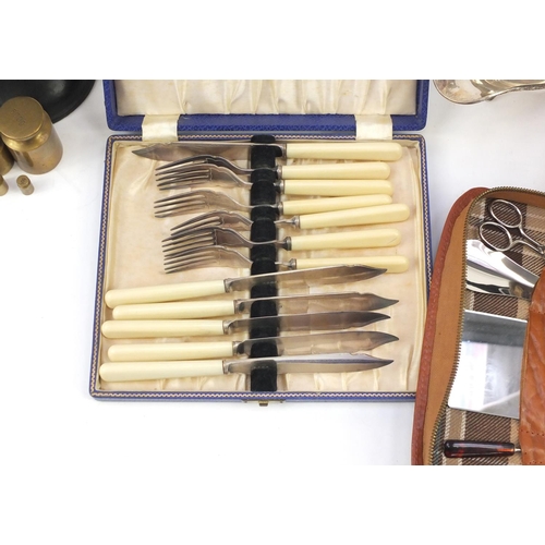 854 - Miscellaneous items including a set of cast iron scales, silver plated cutlery and vintage cameras