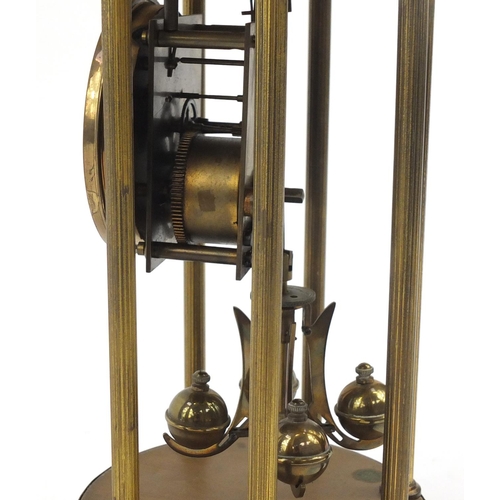 128 - Brass Anniversary clock with enamelled dial, marked made in Germany to the movement, with glass dome... 