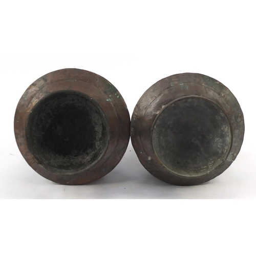 71 - Pair of Middle Eastern copper vessels both inscribed Mustafa, 42.5cm high