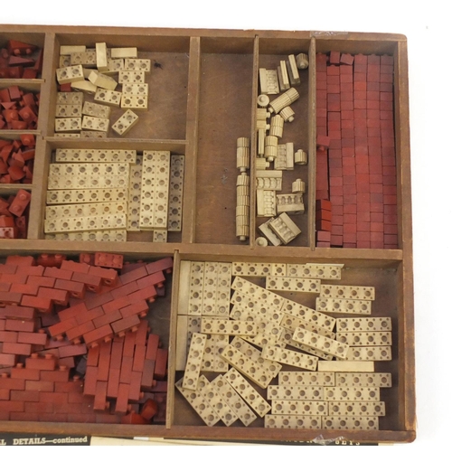 841 - Vintage Minibrix rubber building blocks, with instructions