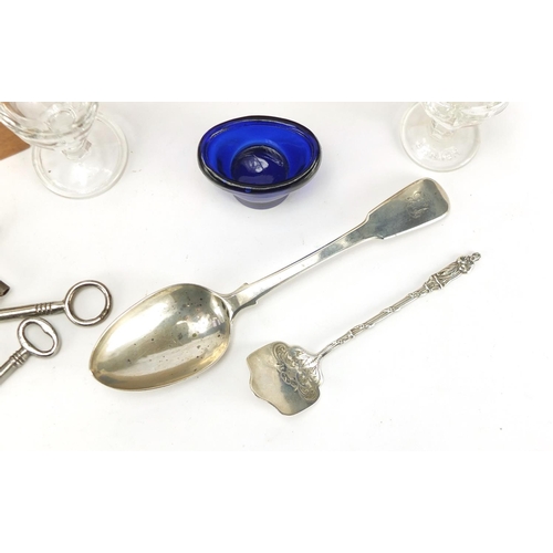 701 - Miscellaneous objects including a Georgian silver tablespoon, silver scoop and a collection of keys