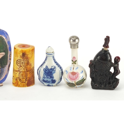 684 - Mostly Chinese snuff and scent bottles including a rhino horn style example and a carved bone exampl... 