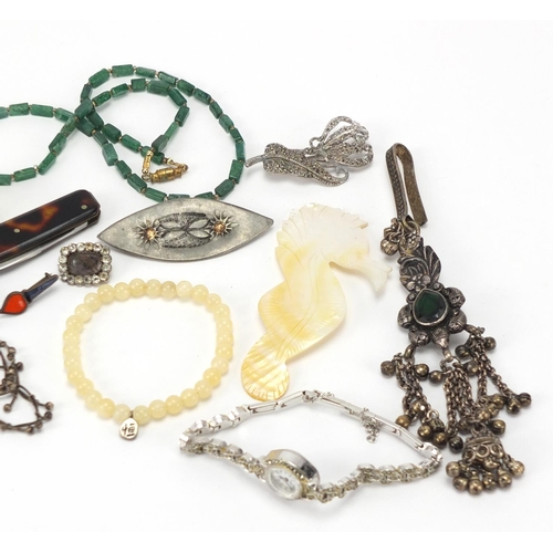 688 - Costume jewellery including a Georgian mourning brooch, marcasite brooch and a malachite necklace