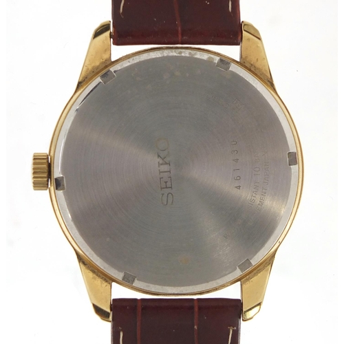 323 - Gentleman's Seiko Solar wristwatch with day date dial, 4.5cm in diameter