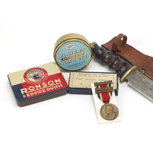 700 - Objects including tobacco tins, hunting knife and Military shell cases
