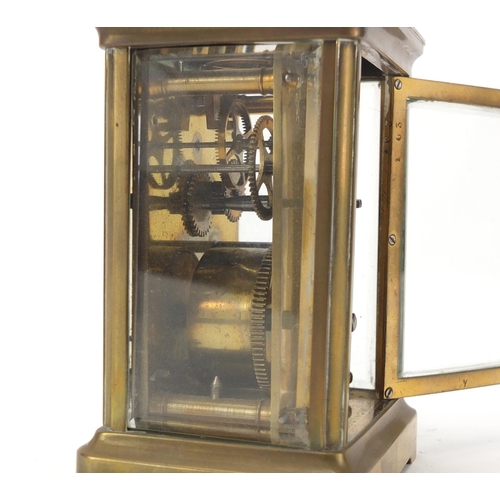 224 - Brass cased carriage clock with enamelled dial, 11cm high