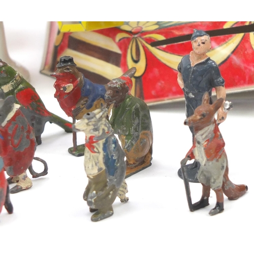 565 - Vintage toys including hand painted lead figures and carousels