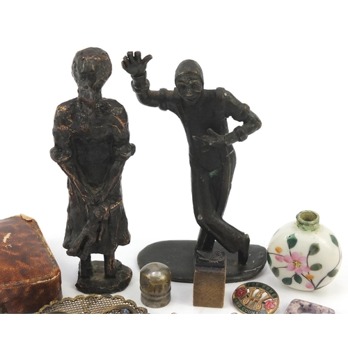 717 - Objects including bronzed figures, silver pendants, porcelain scent bottle and butterfly brooch