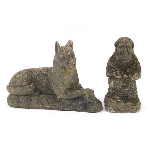 109 - Stoneware garden figure of a dog and imp, the dog 45cm in length