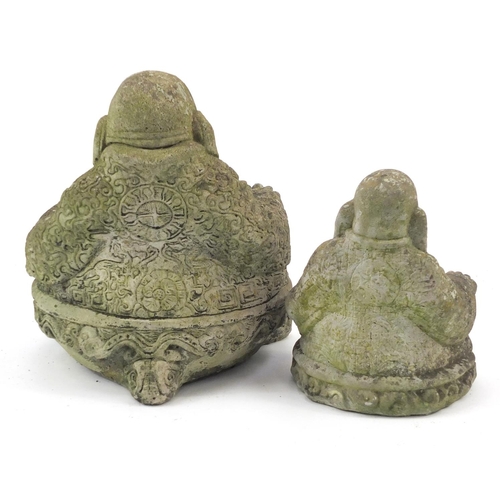 83 - Two stoneware garden figures of seated Buddha, the largest 29cm high