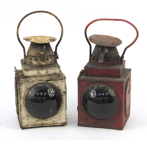 144 - Two vintage railway oil lanterns, one with Vaporite porcelain burner