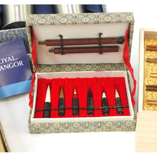 564 - Japanese items including a calligraphy set, cloisonné dishes, exotic wood chopsticks and pewter cups