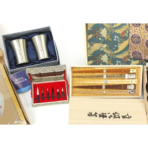 564 - Japanese items including a calligraphy set, cloisonné dishes, exotic wood chopsticks and pewter cups