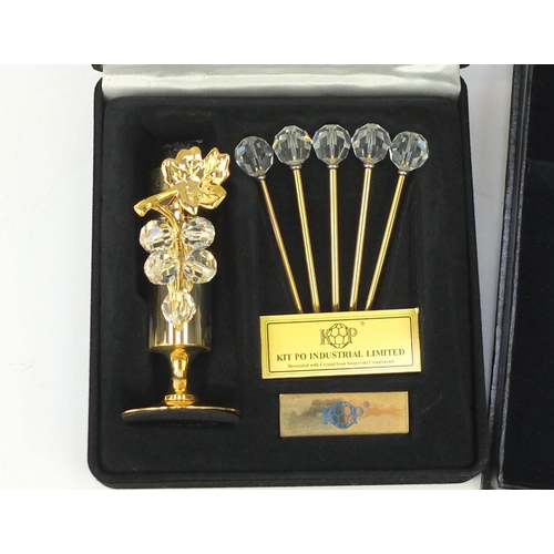 676 - Japanese Swarovski and 24ct gold plated cocktail sticks and teaspoons