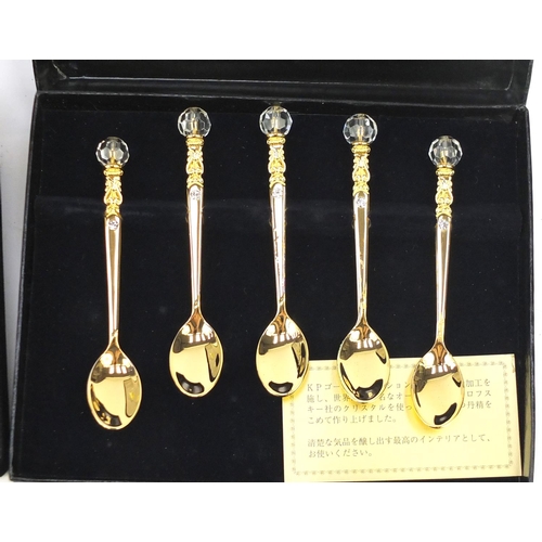 676 - Japanese Swarovski and 24ct gold plated cocktail sticks and teaspoons