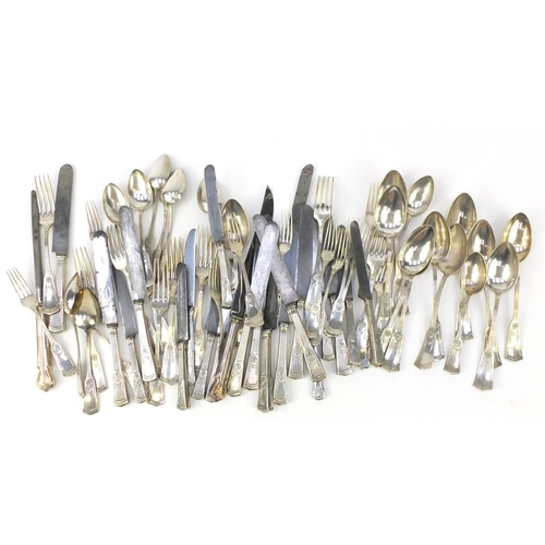 296 - Silver plated cutlery suite decorated with swags and a rosette