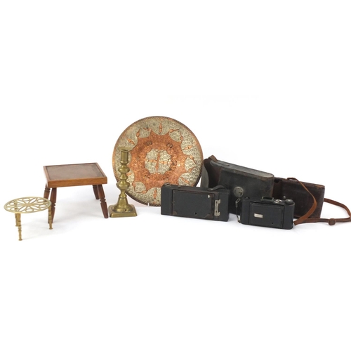758 - Miscellaneous items including vintage cameras, brass candlestick and trivet
