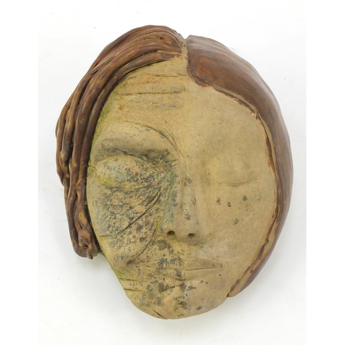 425 - Pottery mask of an Art Deco female, 18.5cm high