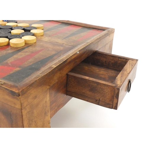 77 - Mexican pine Backgammon table, fitted with a drawer to each end, 22.5cm H x 51cm W x 40cm D