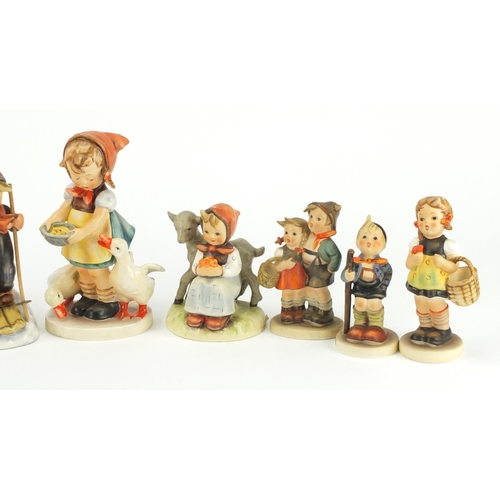 2105 - Ten Goebel hand painted figures including Good Friends and Trumpet Boy, the largest 16cm high