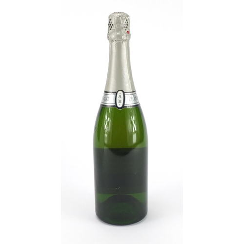 2048 - Bottle of Augustus Barmett Queen's Silver Jubilee champagne