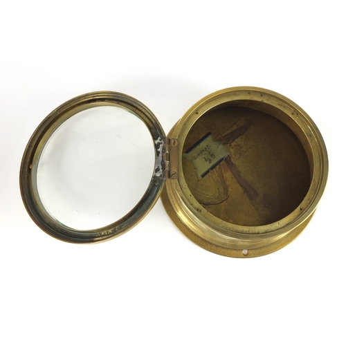 2094 - Empire brass ships bulk head clock, with subsidiary dial and Roman numerals, 20cm in diameter