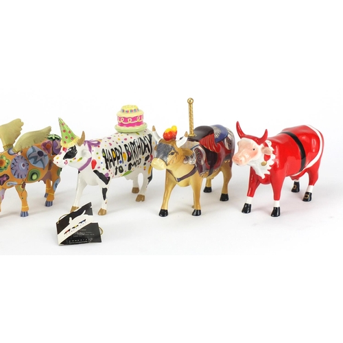2095 - Six collectable Cow Parade cows including Party Cow, Infiniti Cow and Angeli Cow,  each approximatel... 