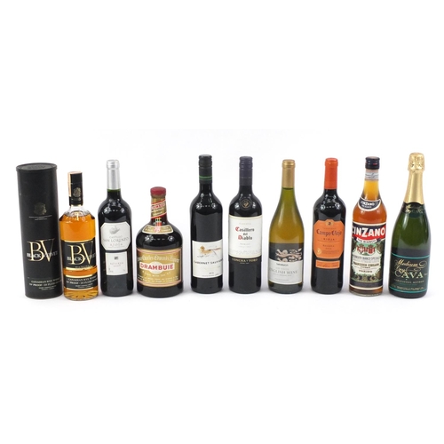 96 - Nine bottles of alcohol including Black Velvet Canadian Rye whiskey, Drambuie and Cava