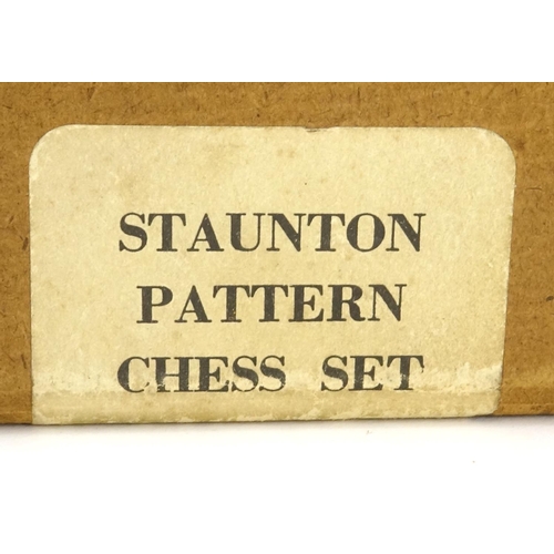 610 - Boxwood Staunton pattern chess set with box, the largest piece 10cm high