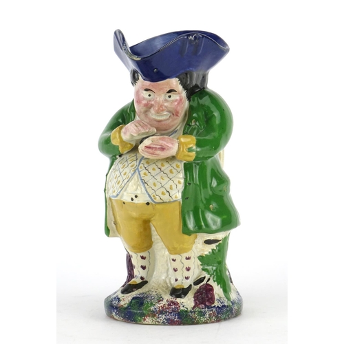 2210 - 19th century Staffordshire pottery snuff taker toby jug, 24cm high