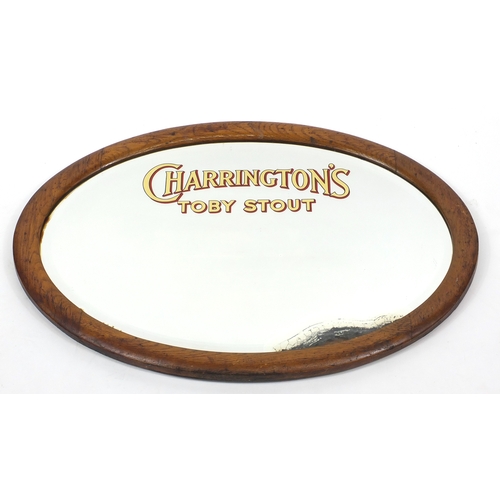 23 - Vintage oak framed Charrington's Toby Stout advertising mirror, with bevelled plate, 86ccm x 61cm