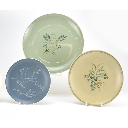 733 - Six Poole pottery plates including two with leaping deer design, the largest 26cm in diameter