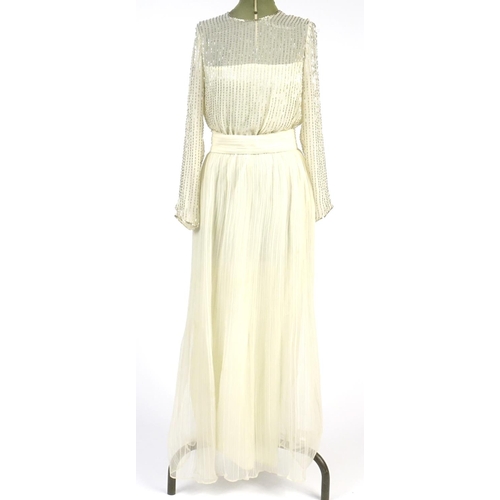 821 - Two 1980's ball gowns and an evening dress comprising Sara Sturgeron, Jack Bryan size 10 and Kofi An... 