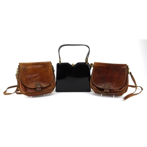 827 - Three vintage handbags comprising two brown leather shoulder bags by The Bridge and an evening bag b... 