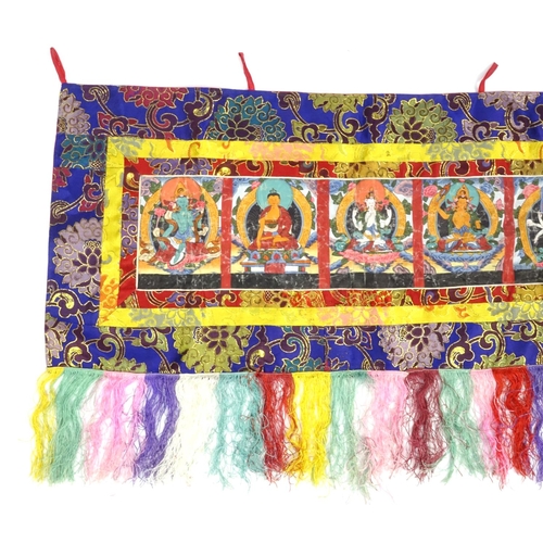 752 - Tibetan wall hanging banner painted with deities, 91cm x 40cm