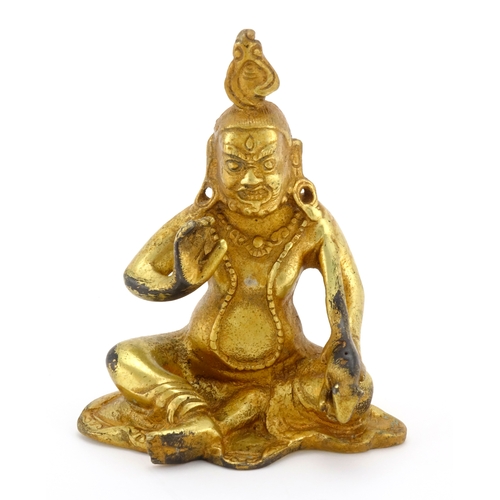 530 - Chino Tibetan gilt figure of seated Buddha, 10cm high