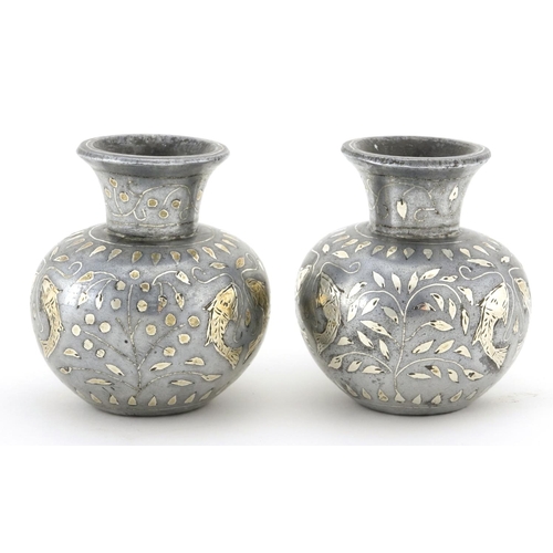 634 - Pair of Indian Bidriware vases, decorated with stylised fish and flowers, each 6.5cm high