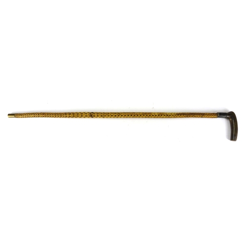 2185 - Horn handled vertebrae walking stick, with silver collar, 85cm in length