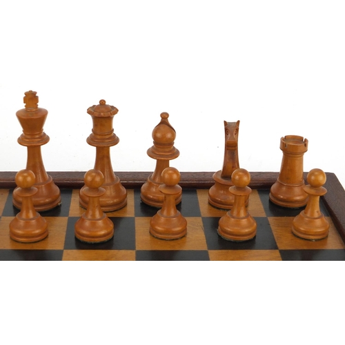 2331 - Boxwood chess set with mahogany chessboard, the largest chess piece 8cm high