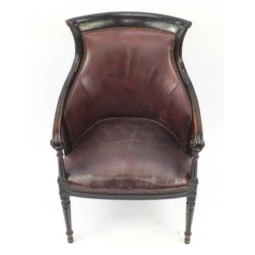 2022 - Mahogany and brown leather library chair on tapering legs, 91cm high