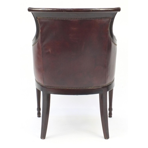 2006 - Mahogany and brown leather library chair on tapering legs, 91cm high