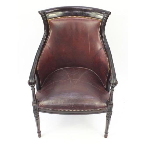 2012 - Mahogany and brown leather library chair on tapering legs, 91cm high