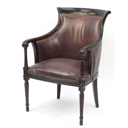 2027 - Mahogany and brown leather library chair on tapering legs, 91cm high