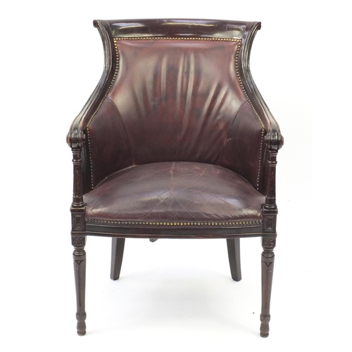 2021 - Mahogany and brown leather library chair on tapering legs, 91cm high