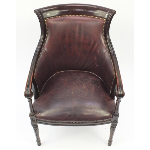 2021 - Mahogany and brown leather library chair on tapering legs, 91cm high