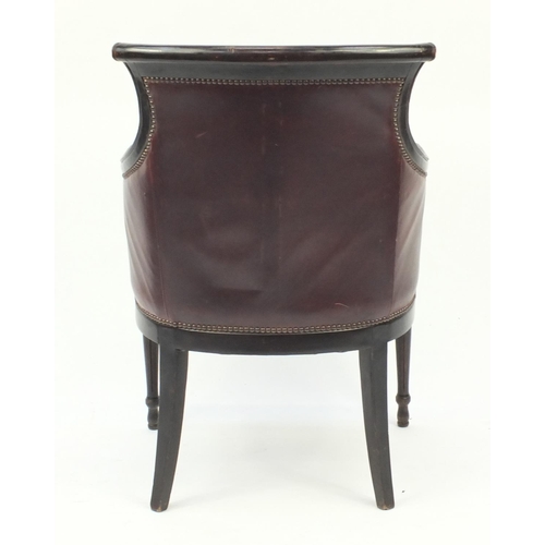 2005 - Mahogany and brown leather library chair on tapering legs, 91cm high