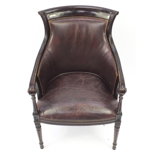2006 - Mahogany and brown leather library chair on tapering legs, 91cm high